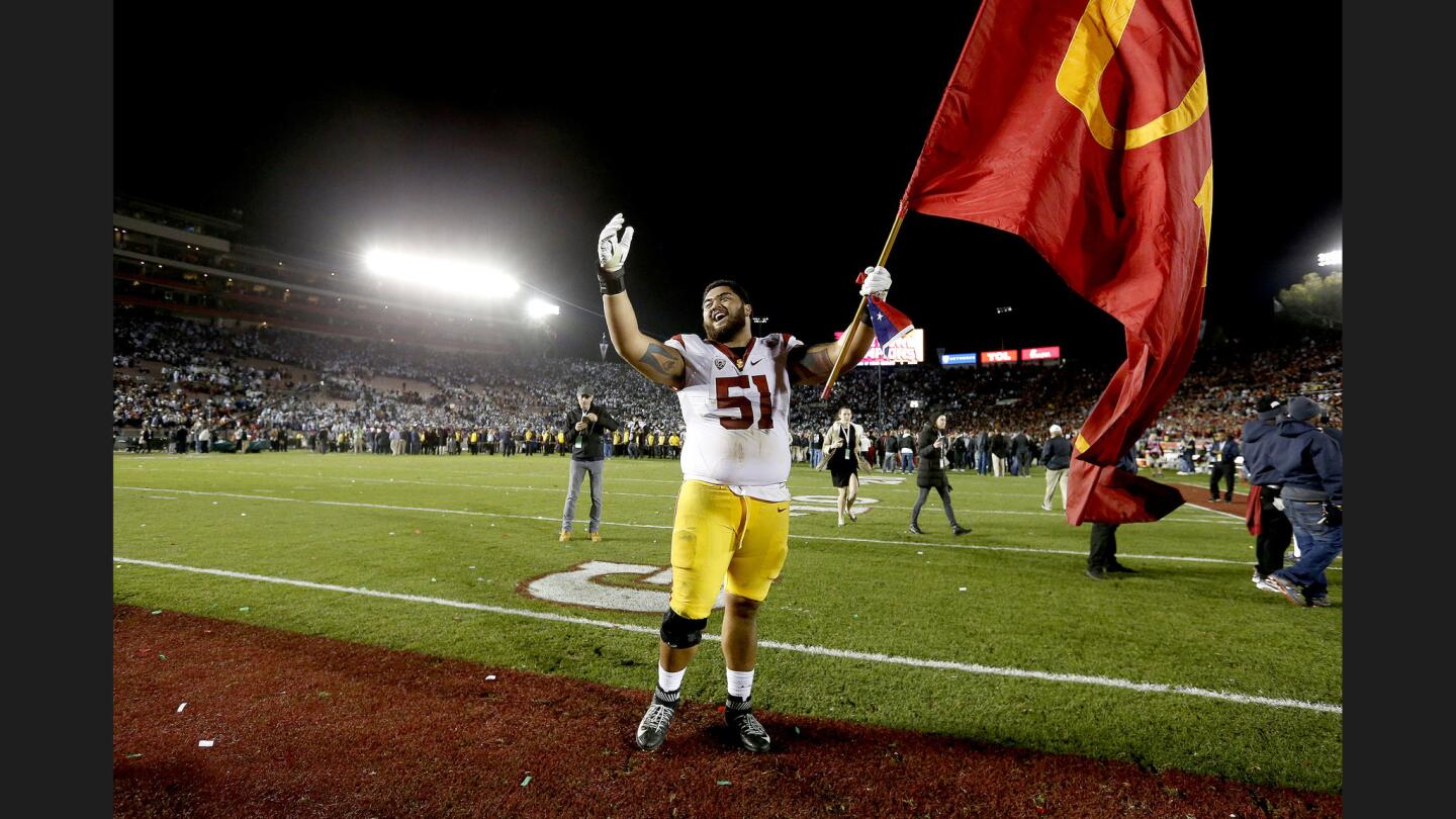 USC Trojans guard Damien Mama celebrates the Trojans' win over the Penn State Nittany Lions.