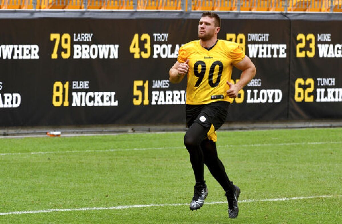 Pittsburgh Steelers linebacker T.J. Watt runs sprints during NFL football training camp Thursday, Aug. 19, 2021, in Pittsburgh. (Matt Freed/Pittsburgh Post-Gazette via AP)