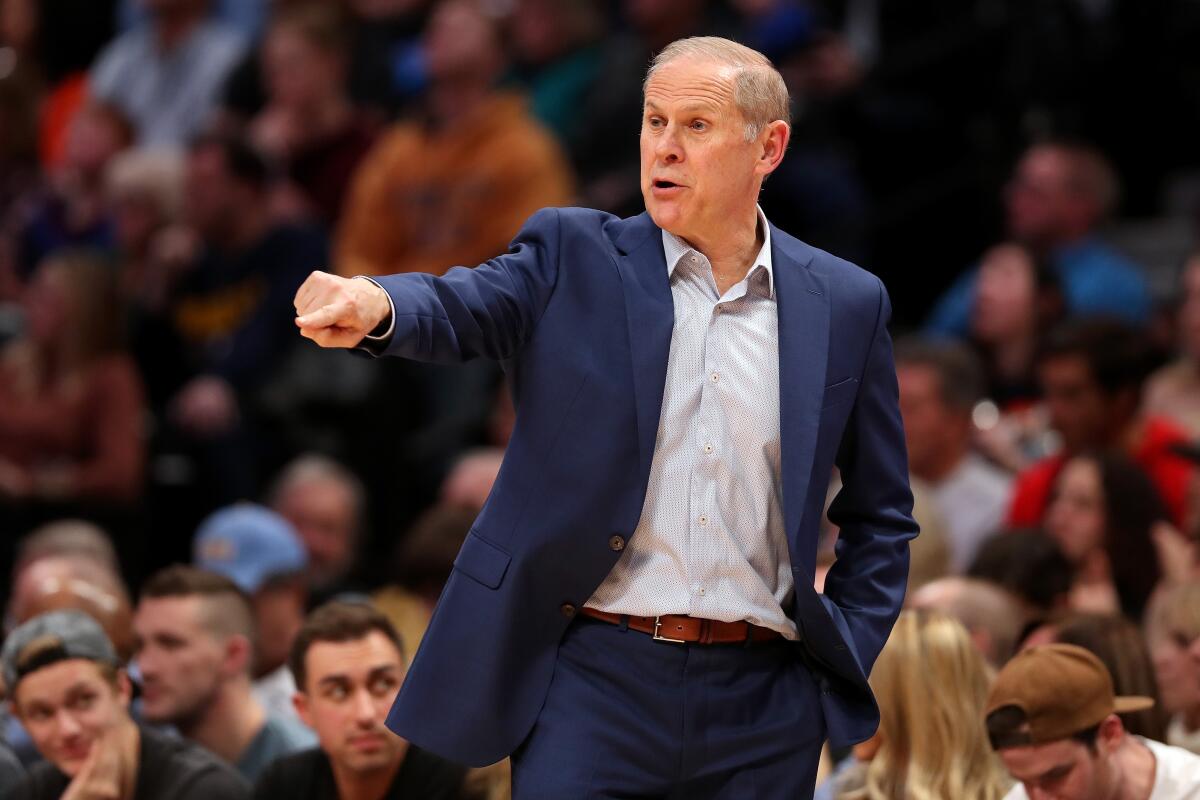 Cavaliers coach John Beilein calls out instructions to his players during a game against the Nuggets on Jan. 11 at the Pepsi Center. 