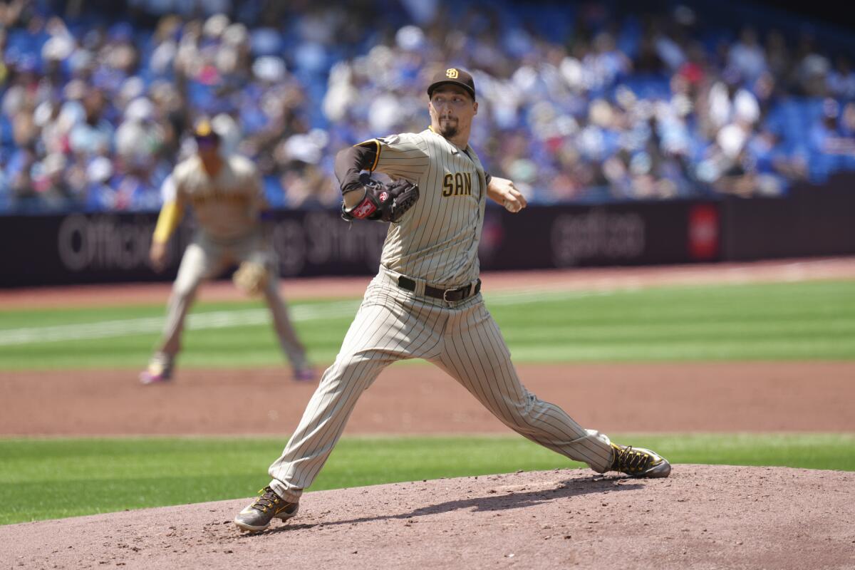 July 20, 2023, TORONTO, ON, CAN: San Diego Padres relief pitcher Luis Garcia  react after hitting