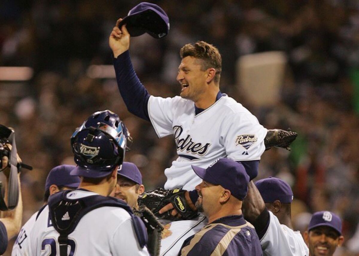 Padres closer Trevor Hoffman is lifted onto teammates' shoulders after notching his 500th career save, on June 6, 2007.