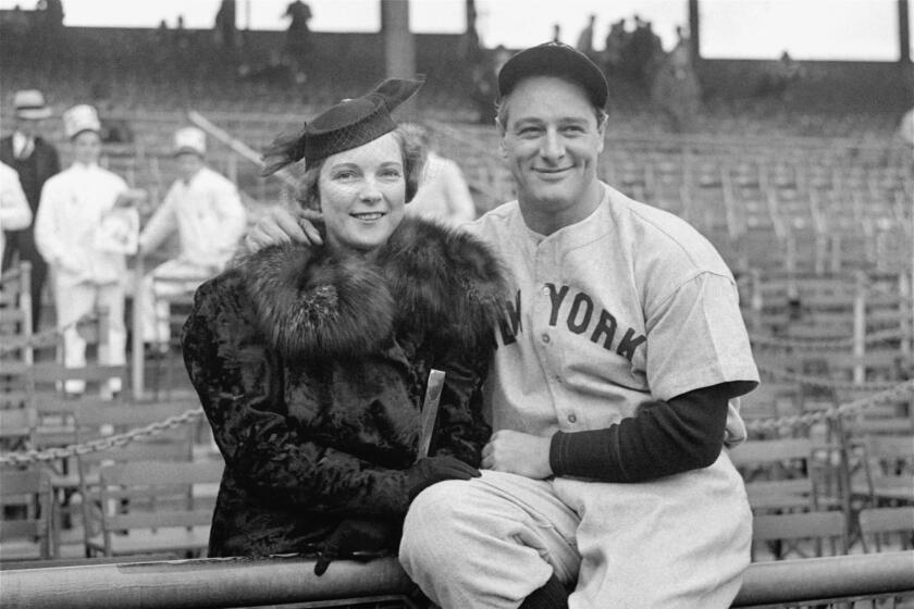 Lou Gehrig, "the Iron Horse," and his wife, Eleanor, who were married in 1933, pose together before Game 1 of the World Series at the Polo Grounds, September 30, 1936. In his famous farewell speech on July 4, 1939, Lou said of Eleanor, "When you have a wife who has been a tower of strength and shown more courage than you dreamed existed, that's the finest I know." Eleanor later echoed his sentiment, saying, "I would not have traded two minutes of the joy and the grief with that man for two decades of anything with another." (AP Photo)