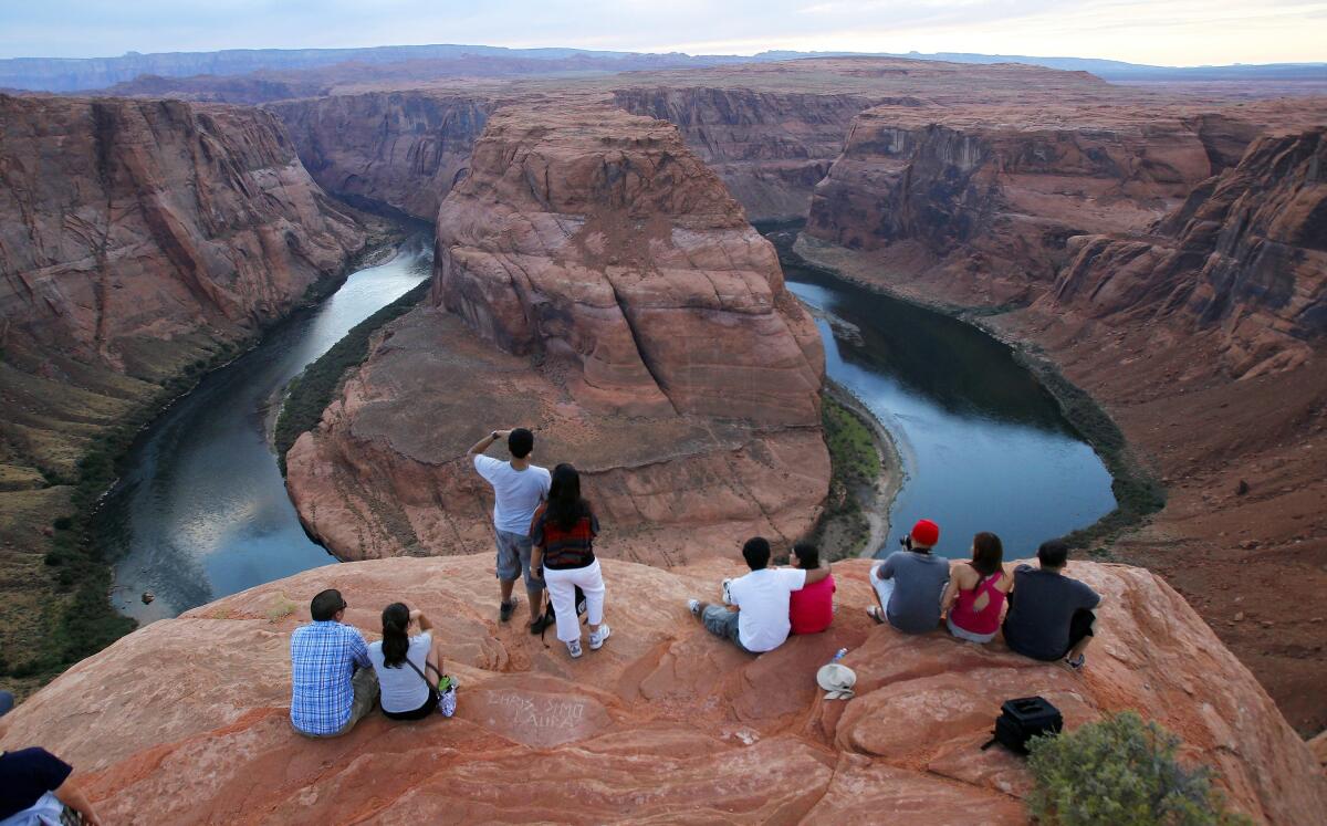 Visitors view the Colorado River.