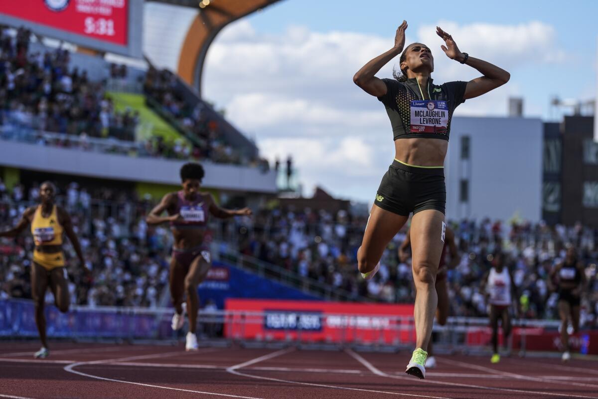 Sydney McLaughlin-Levrone reacts after winning the women's 400-meter hurdles.