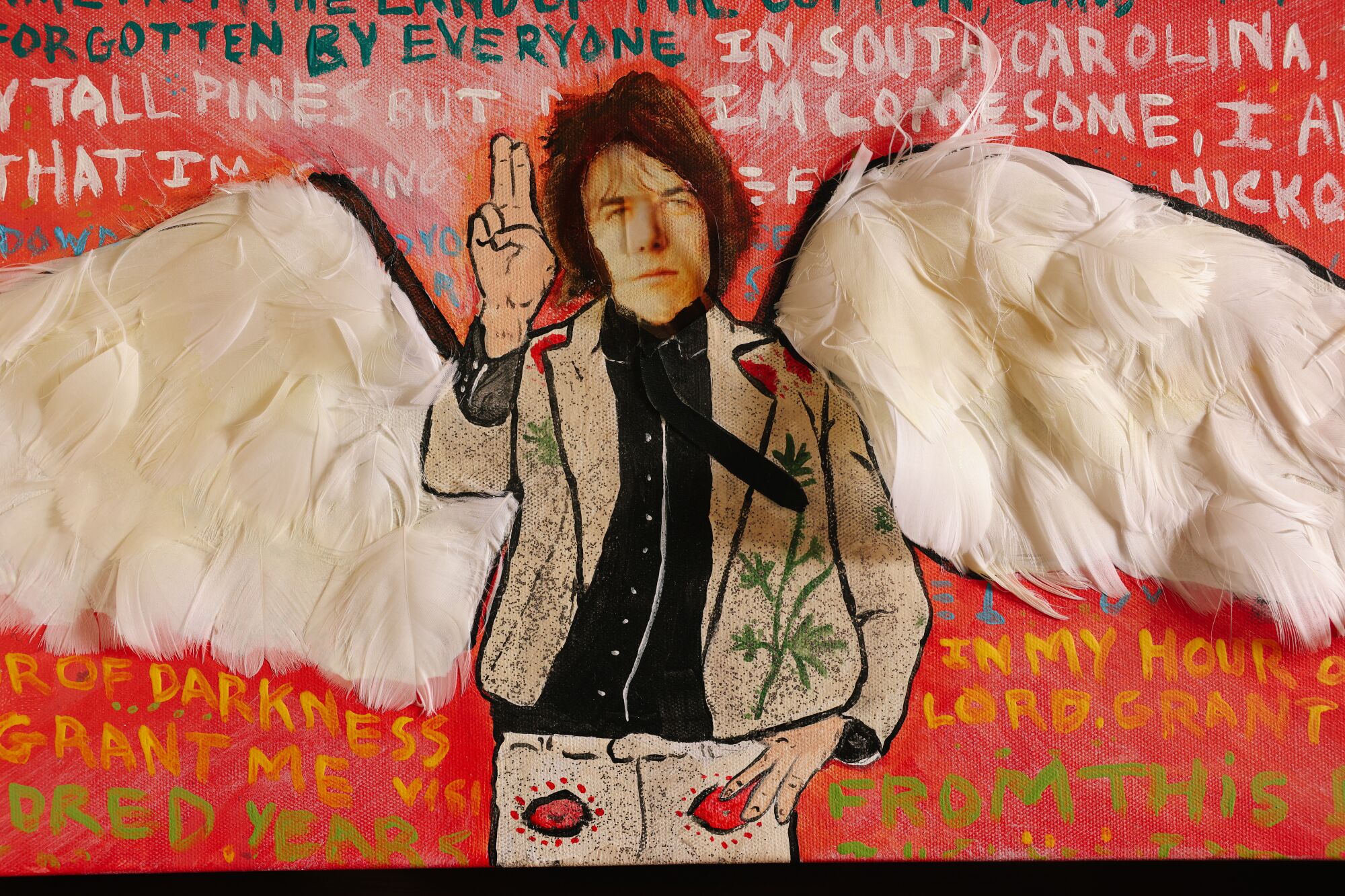 A collage featuring the face of Gram Parsons attached to a colorful drawing of his body, with feathered wings at his back.