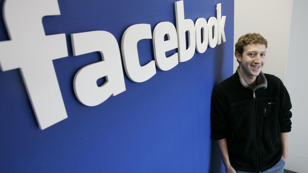 Mark Zuckerberg poses at Facebook offices in Palo Alto in 2007.