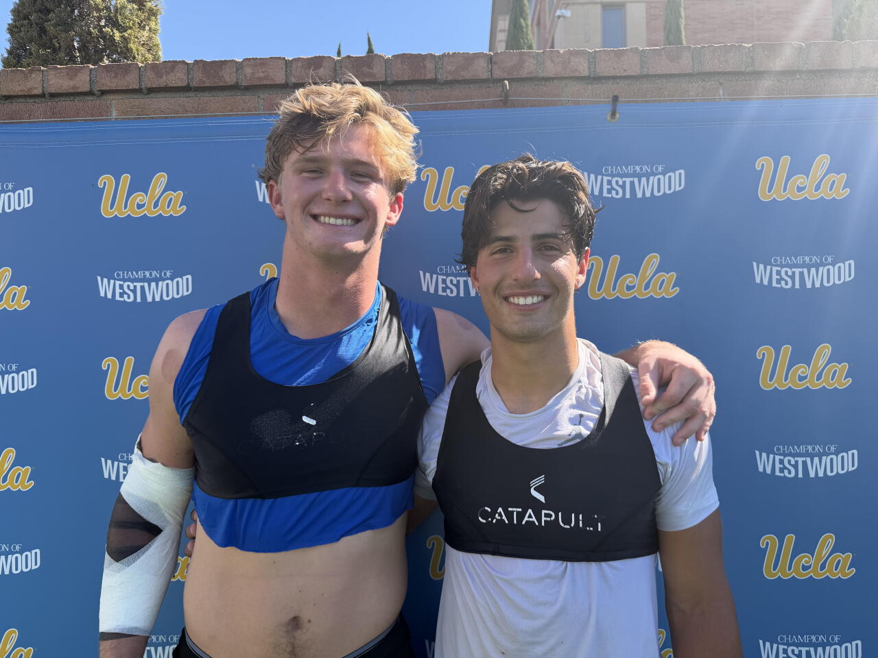 Linebacker Scott Taylor (left) and receiver Shane Rosenthal, graduates of Loyola and Newbury Park.