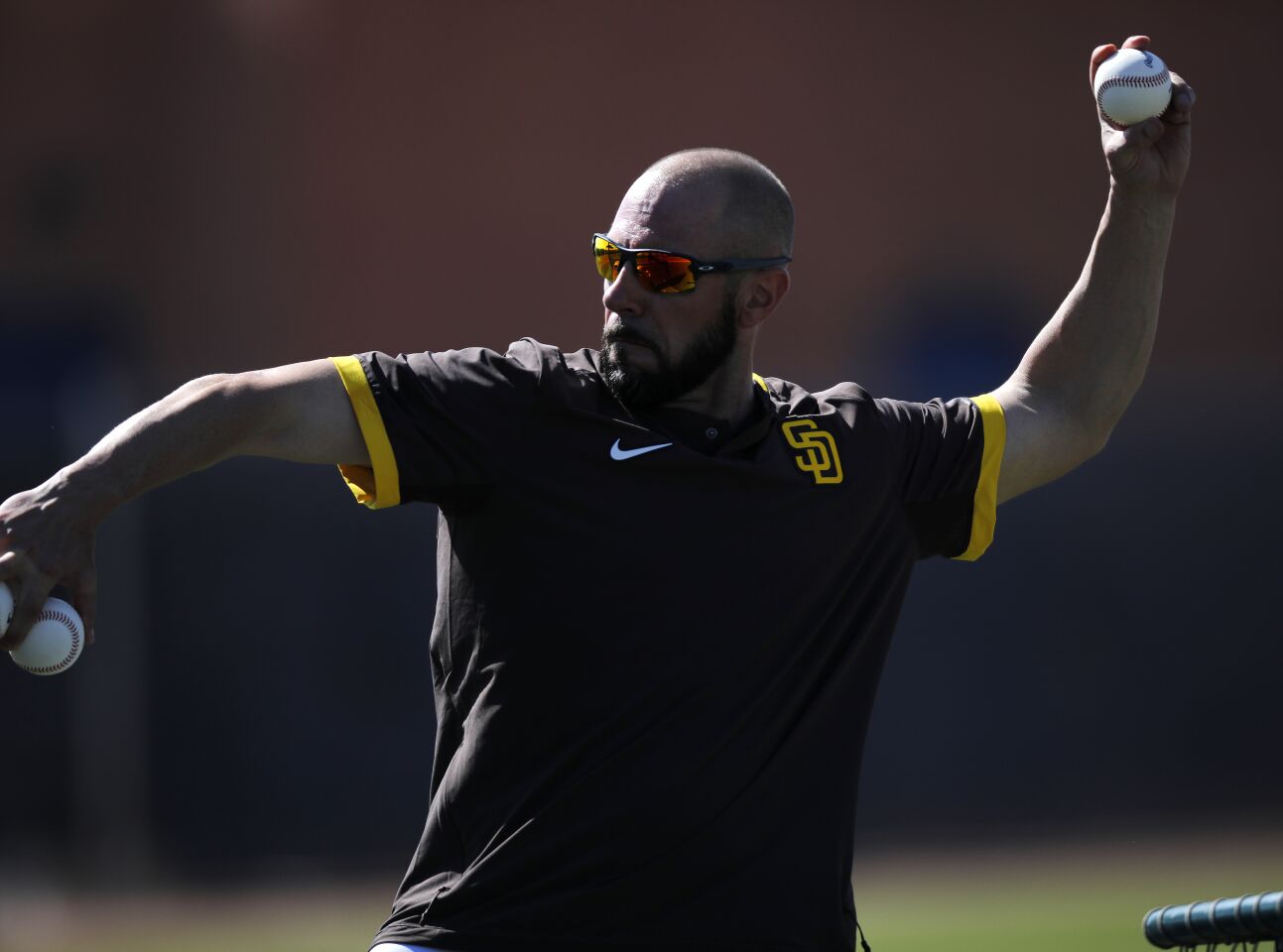 San Diego Padres manager Jayce Tingler pitches during a spring training practice on Feb. 18, 2020.
