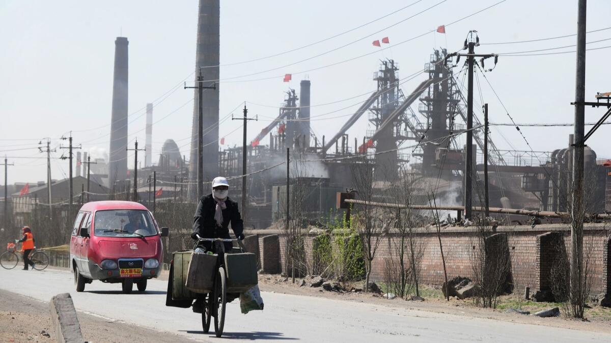 Dozens of factories process rare earths, iron and coal on the outskirts of Baotou city in Inner Monglia, northwest China.