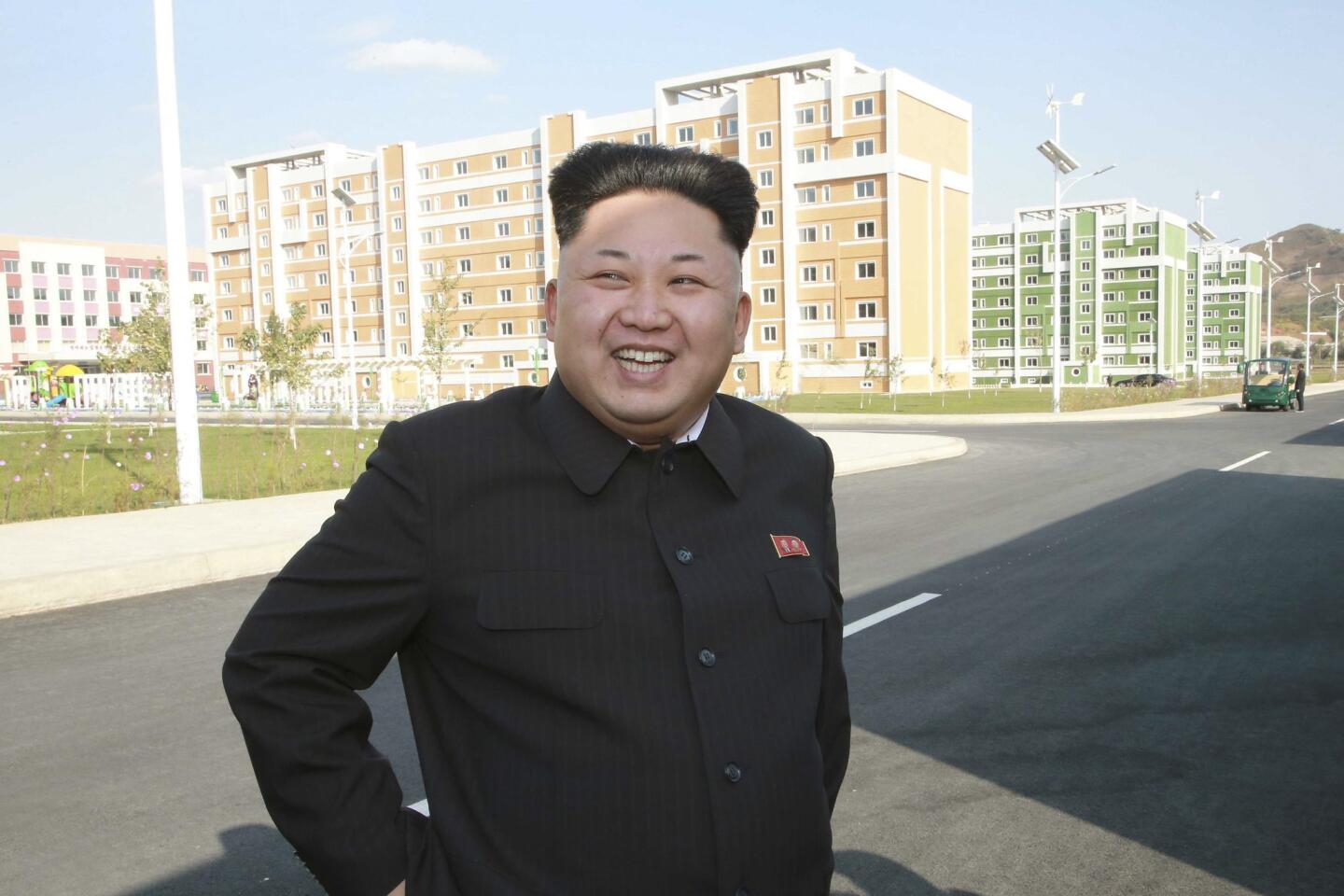 North Korean leader Kim Jong Un gives field guidance to the newly built Wisong Scientists Residential District in this undated photo released by North Korea's Korean Central News Agency on Oct. 14.