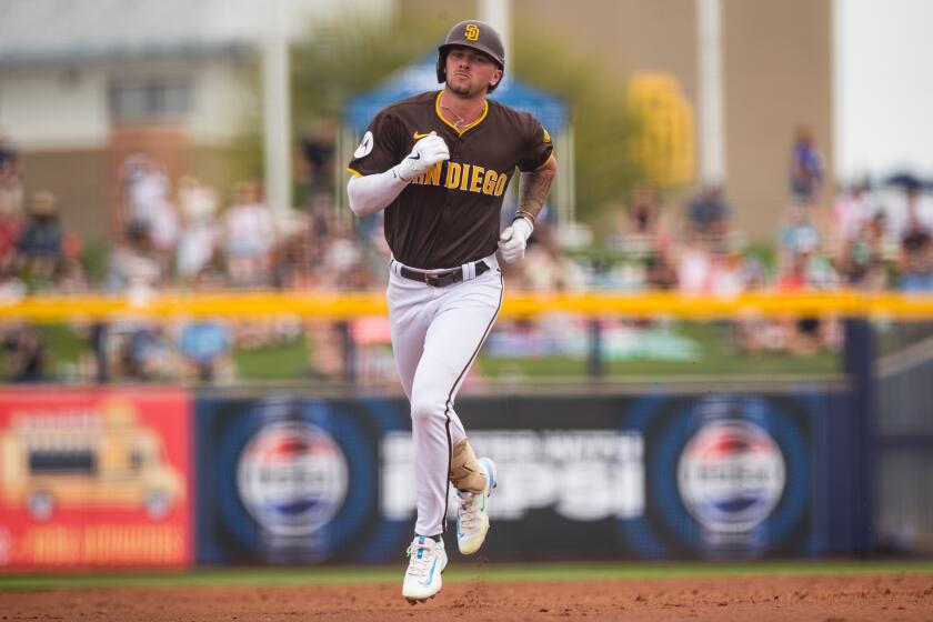 PEORIA, ARIZONA - MARCH 12: Jackson Merrill #70 of the San Diego Padres rounds the bases after hitting a home ru during the second inning of the spring training game against the Arizona Diamondbacks at Peoria Sports Complex on March 12, 2024 in Peoria, Arizona. (Photo by John E. Moore III/Getty Images)