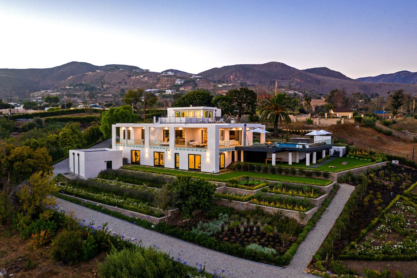 The newly-finished home near Zuma Beach is geared for indoor-outdoor living with pocketing walls, wrap-around terraces, balconies and a rooftop deck.