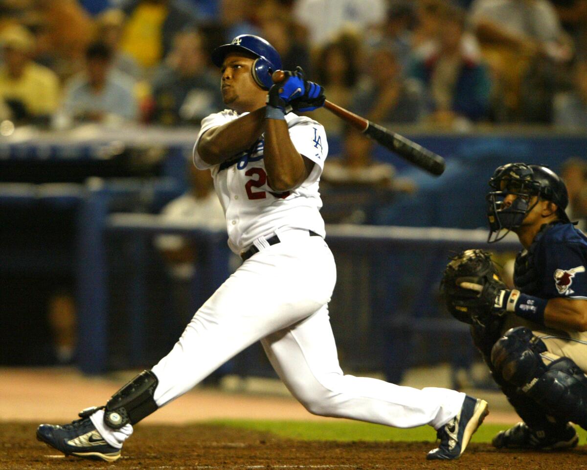 The Dodgers' Adrián Beltré hits a walk-off home run against the San Diego Padres on  July 23, 2004.