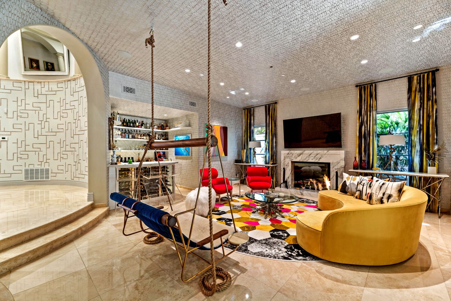 A swing-style seat is suspended from the ceiling in the family room of Cuoco's former home.