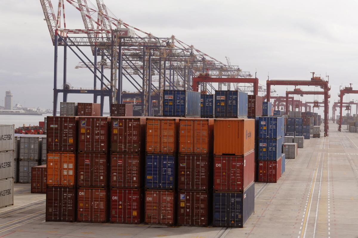 Container ships wait to be loaded in Cape Town, South Africa. Commonwealth countries such as South Africa could see their economies suffer as Britain prepares to leave the European Union.