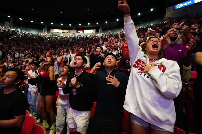 San Diego, CA - April 01: On Saturday, April 1, 2023 in San Diego at SDSU Viejas Arena, Aztecs basketball fans react to watching Aztecs take on the Florida Atlantic Owls in the Final Four game played in Houston, Texas. (Nelvin C. Cepeda / The San Diego Union-Tribune)