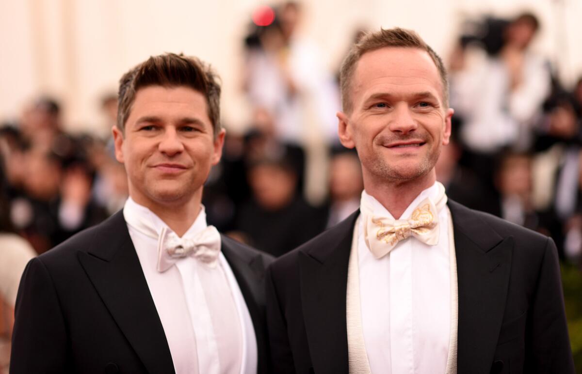 David Burtka and husband Neil Patrick Harris, right, in May. Harris thanked the Supreme Court for its ruling on same-sex marriage in a tweet on Friday.