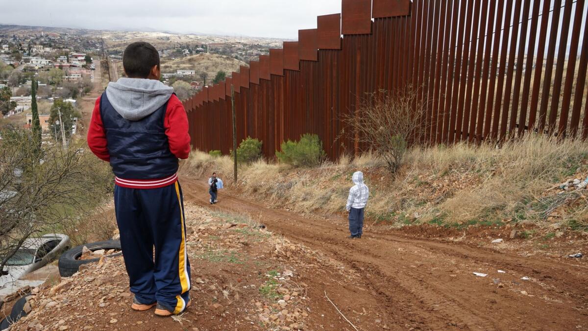 The 15-foot steel fence between portions of Nogales, Ariz., and Nogales, Mexico.