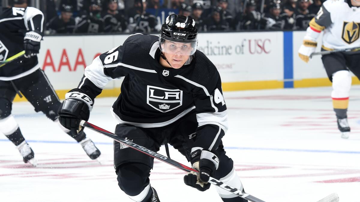 Blake Lizotte of the Los Angeles Kings skates the puck against