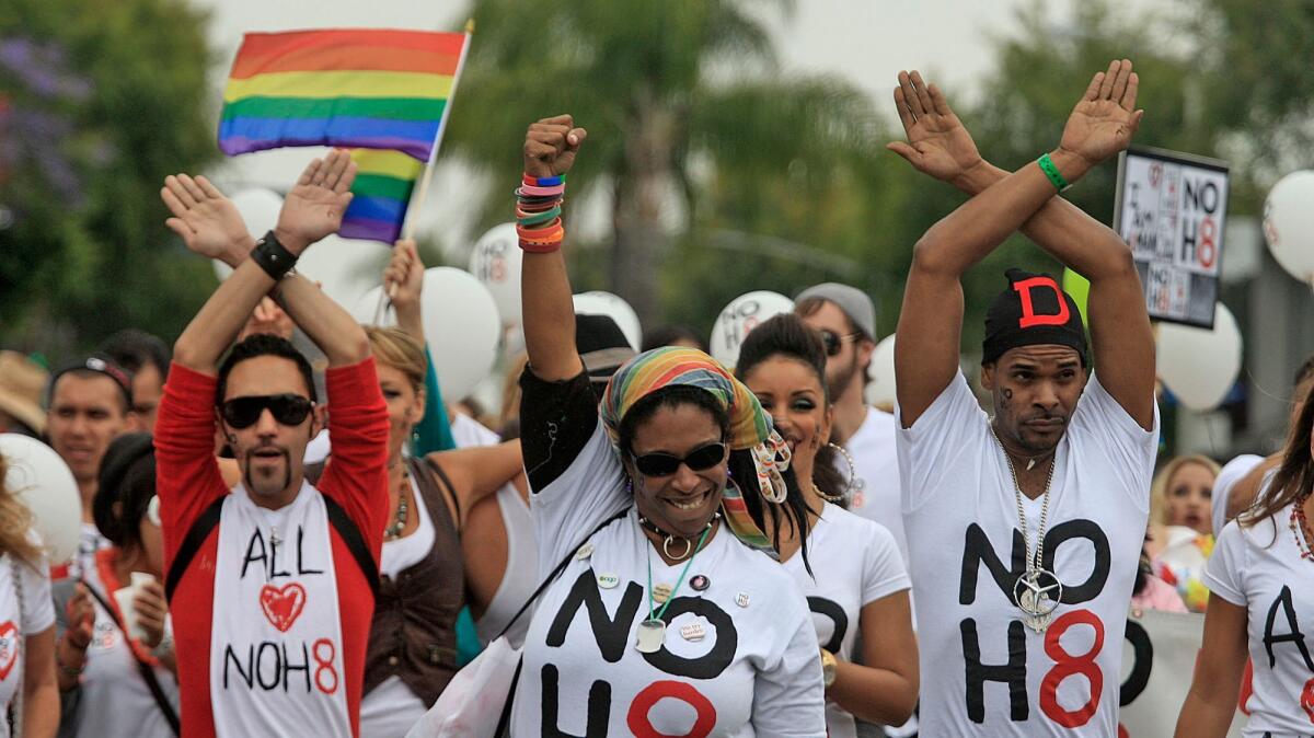 NOH8 participates during the LA Pride Parade on June 12, 2011. (Gary Friedman / Los Angeles Times)