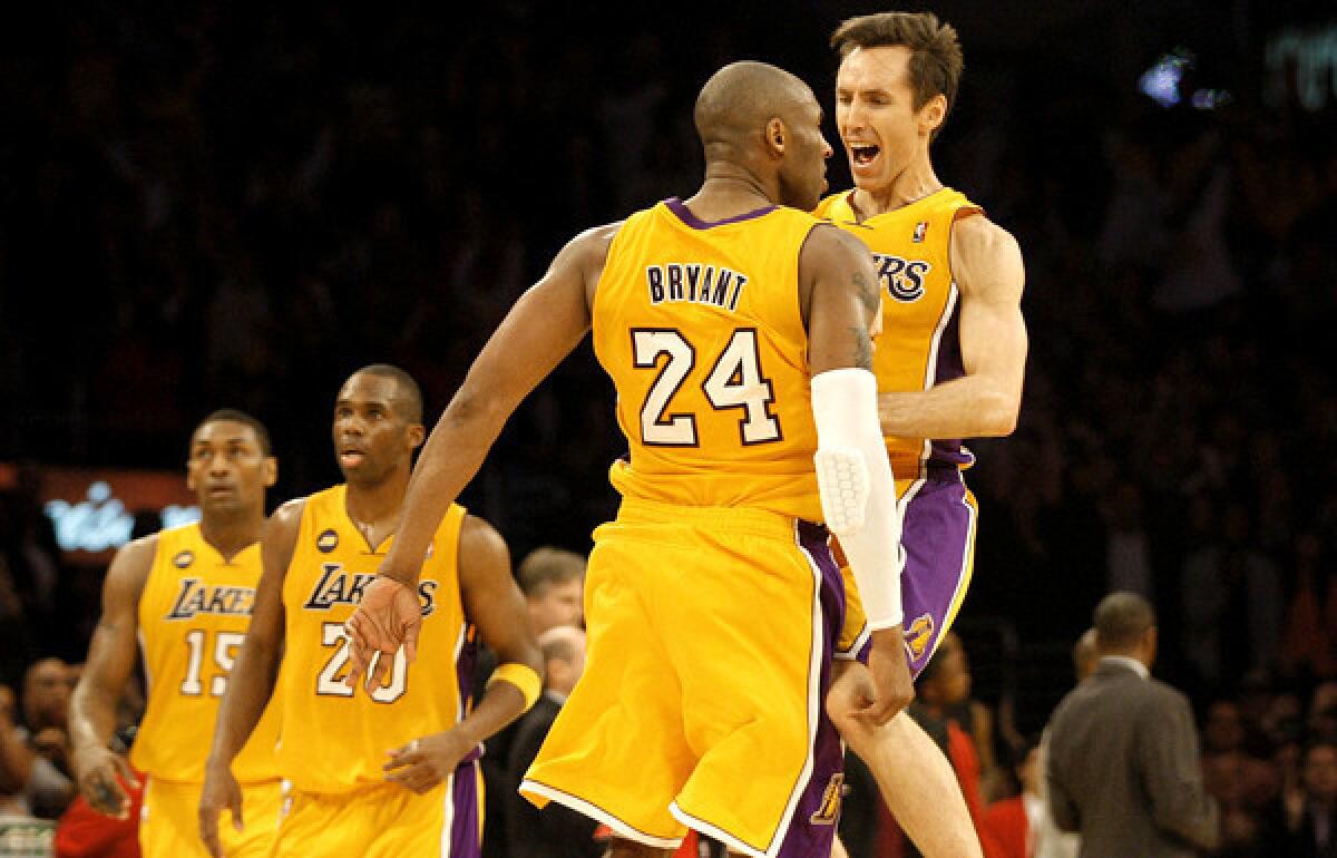 Kobe Bryant and Steve Nash, celebrating a Bryant dunk against the Raptors earlier this season, will try to overcome injuries to play Saturday night against Sacramento.