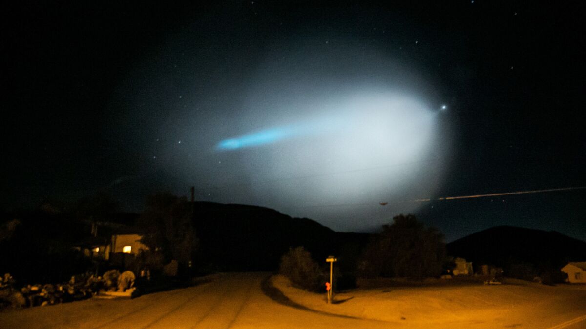 An unarmed Navy missile is seen from Randsburg, Calif. The Navy fired the missile off the coast of Southern California on Saturday, creating a bright light that streaked across the sky.