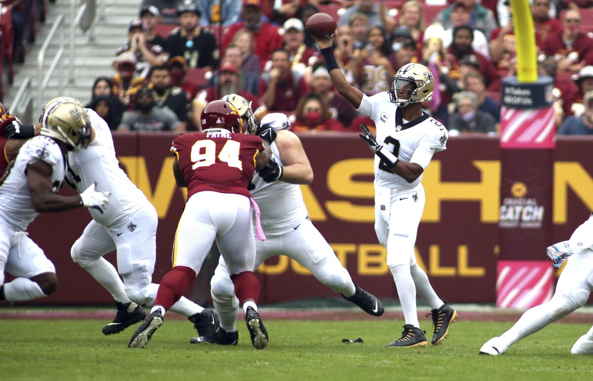 New Orleans Saints quarterback Jameis Winston throws against Washington.