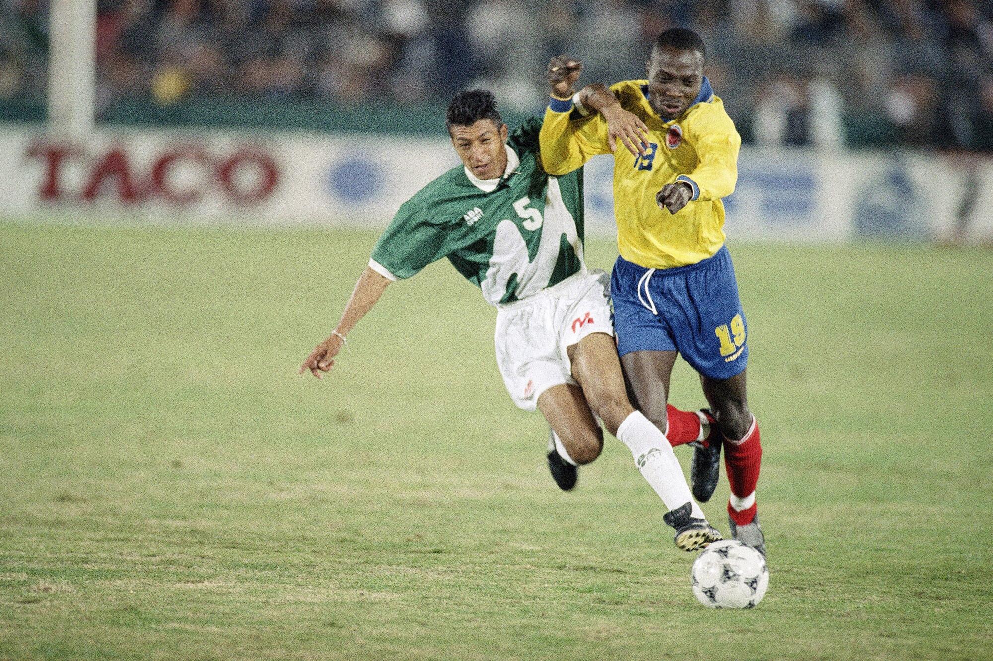 Colombia National Team’s Freddy Rincon, right.