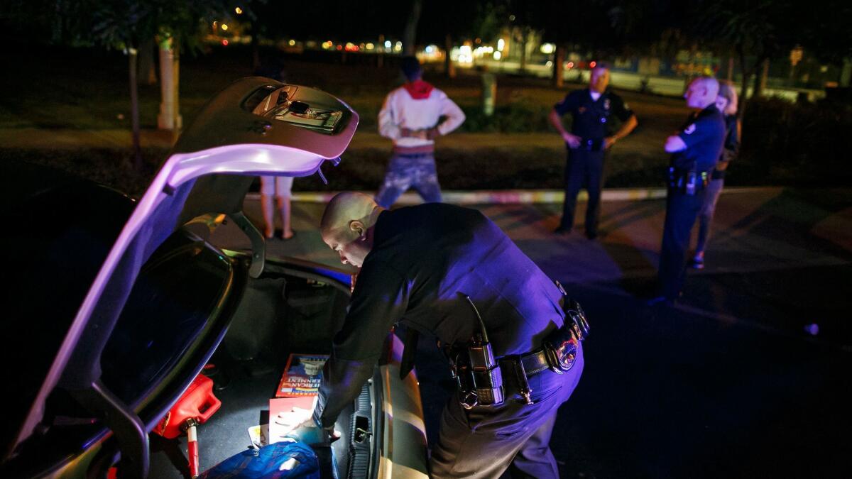 Officers from the LAPD's Metropolitan Division stop drivers and search their vehicles in 2015.