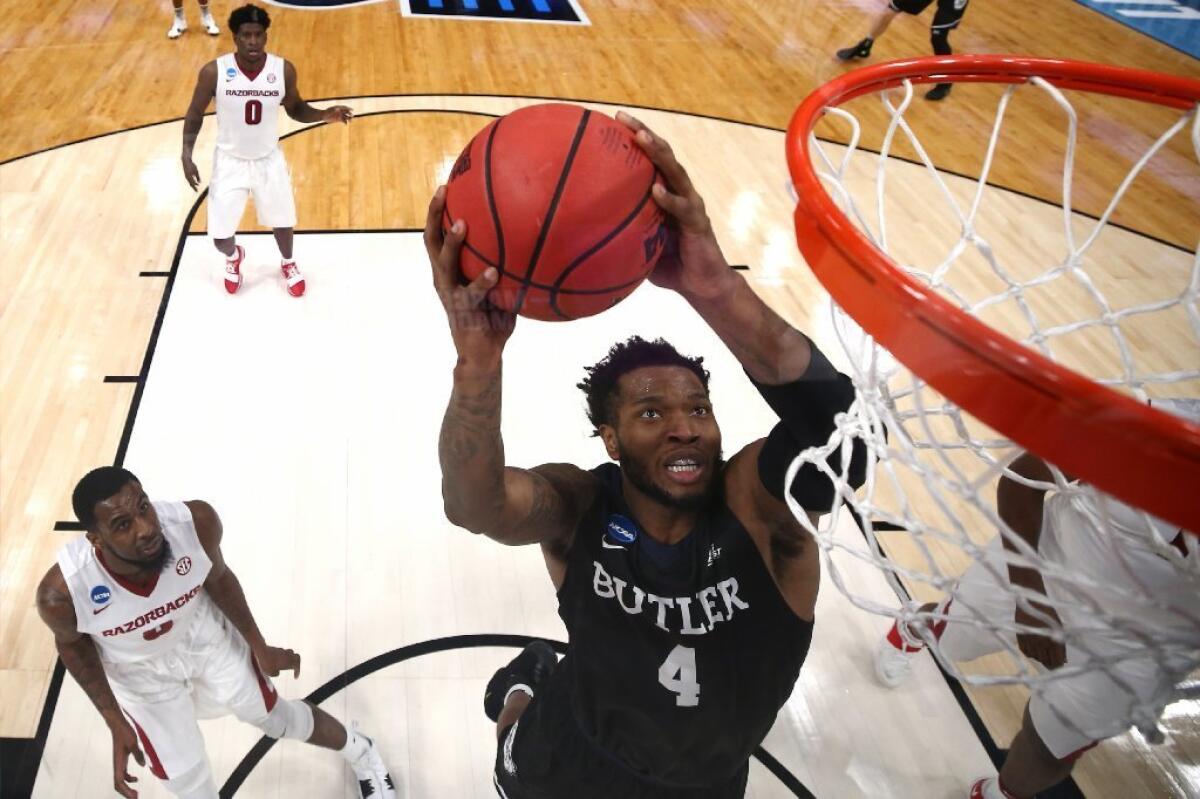 Butler's Tyler Wideman dunks the ball during an NCAA Tournament game against Arkansas.