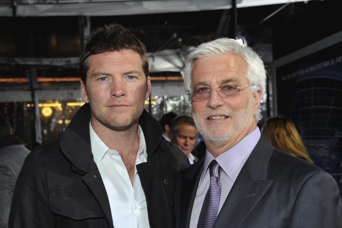 Actor Sam Worthington, left, with Lionsgate Motion Picture Group co-Chair Rob Friedman at the 2012 premiere of "Man on a Ledge."
