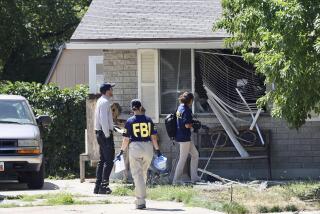 FILE - Law enforcement investigate the scene of a shooting involving the FBI on Aug. 9, 2023, in Provo, Utah. The Utah man accused of making violent threats against President Joe Biden before a western states trip last week pointed a handgun at FBI agents attempting to arrest him, the agency said on Monday, Aug. 14, 2023. (Laura Seitz/The Deseret News via AP, File)