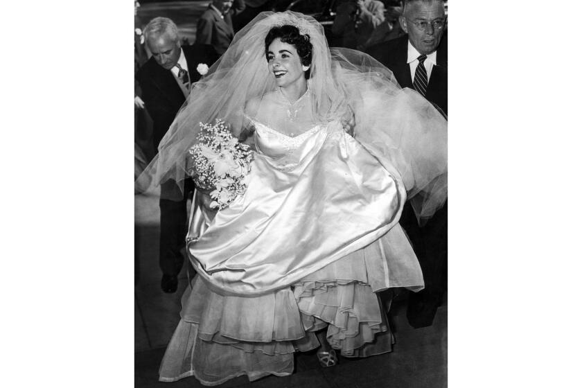Mar. 6, 1950: Elizebeth Taylor enters Church of the Good Shepherd in Beverly Hills for her marriage to Conrad 'Nick' Hilton Jr.