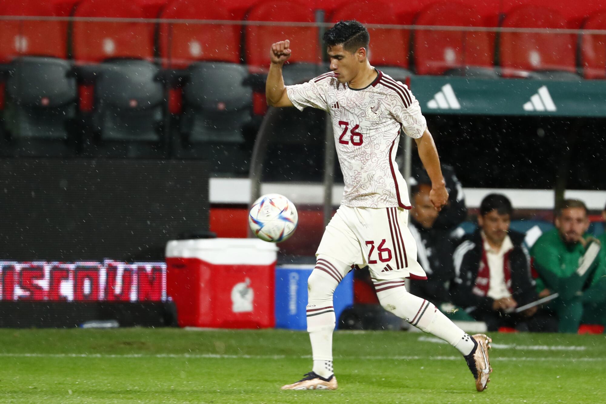 Mexico's Uriel Antuna controls the ball during an international friendly against Iraq.