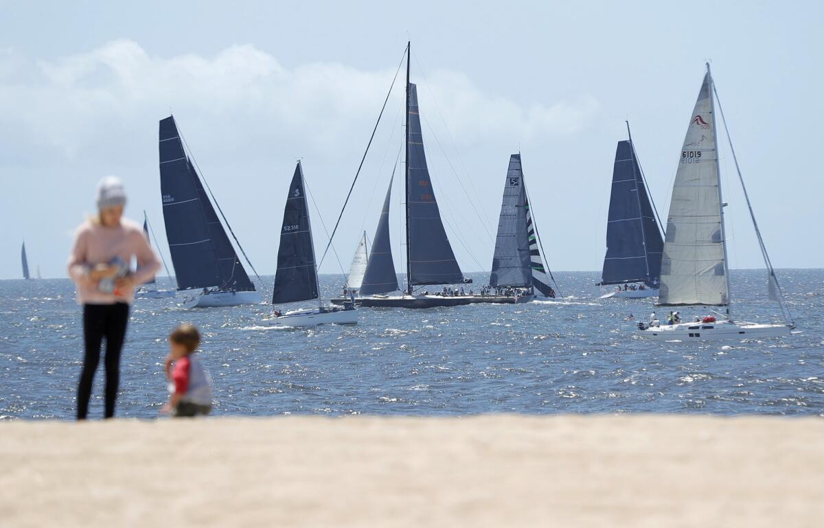 Boats amass near the starting line of the 74th annual Newport to Ensenada boat race north of Balboa Pier on Friday.