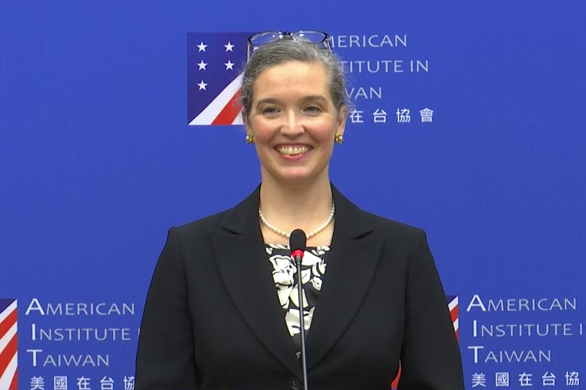 In this image taken from a video footage run by Taiwan's CTS via AP Video, Sandra Oudkirk, the new director of the American Institute in Taiwan, the de facto embassy, speaks during her first public news conference held in Taipei, Taiwan on Friday, Oct. 29, 2021. The U.S. wants to deepen its relationship with Taiwan, the self-ruled island that has become a major point of conflict in the strained U.S.-China relationship, and will work to counter Beijing's "malign" influence, Oudkirk said Friday. (CTS via AP Video)