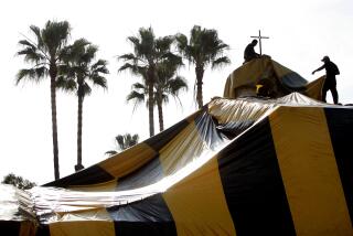 (San Juan) ? At Mission San Juan Capistrano, workers tent the North wing, and it's bell tower for fumigation against both drywood and subterranean termites. PHOTOGRAPHED TUESDAY DECEMBER 27, 2005. (Photo by Don Kelsen/Los Angeles Times via Getty Images)