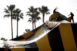 (San Juan)  At Mission San Juan Capistrano, workers tent the North wing, and it's bell tower for fumigation against both drywood and subterranean termites. PHOTOGRAPHED TUESDAY DECEMBER 27, 2005. (Photo by Don Kelsen/Los Angeles Times via Getty Images)