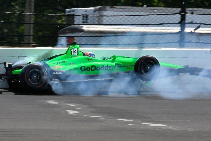 Danica Patrick hits the wall in the second turn during the running of the Indianapolis 500 auto race at Indianapolis Motor Speedway, in Indianapolis Sunday, May 27, 2018. (AP Photo/Greg Huey)