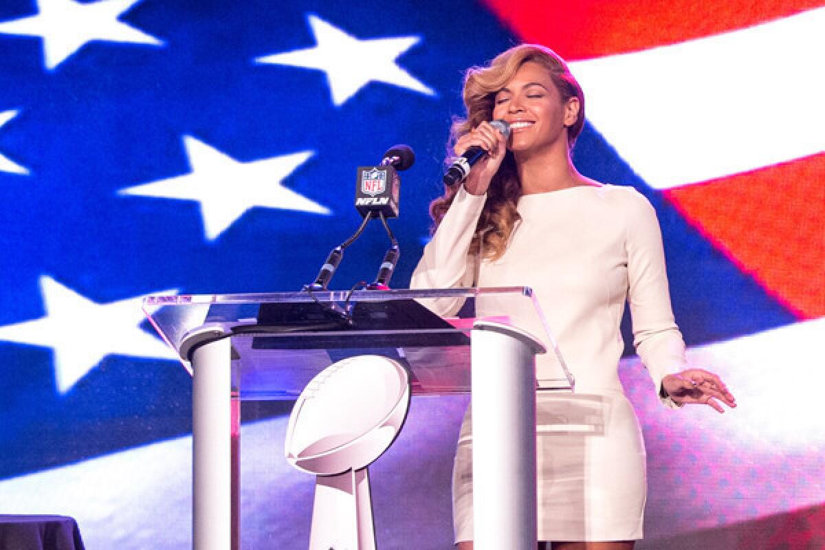 Beyoncé performs at the Pepsi Super Bowl XLVII Halftime Show Press Conference.