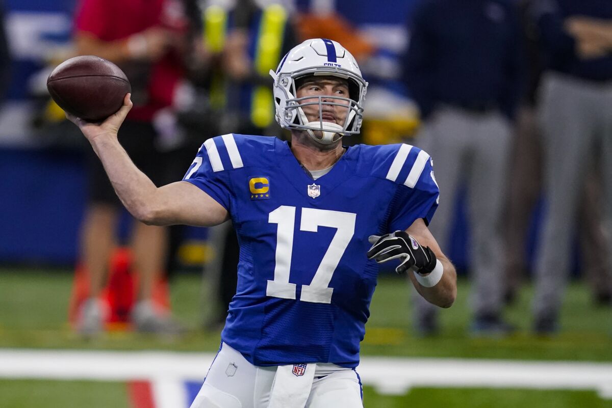 Indianapolis Colts quarterback Philip Rivers (17) throws against the Tennessee Titans in the first half of an NFL football game in Indianapolis, Sunday, Nov. 29, 2020. (AP Photo/Darron Cummings)