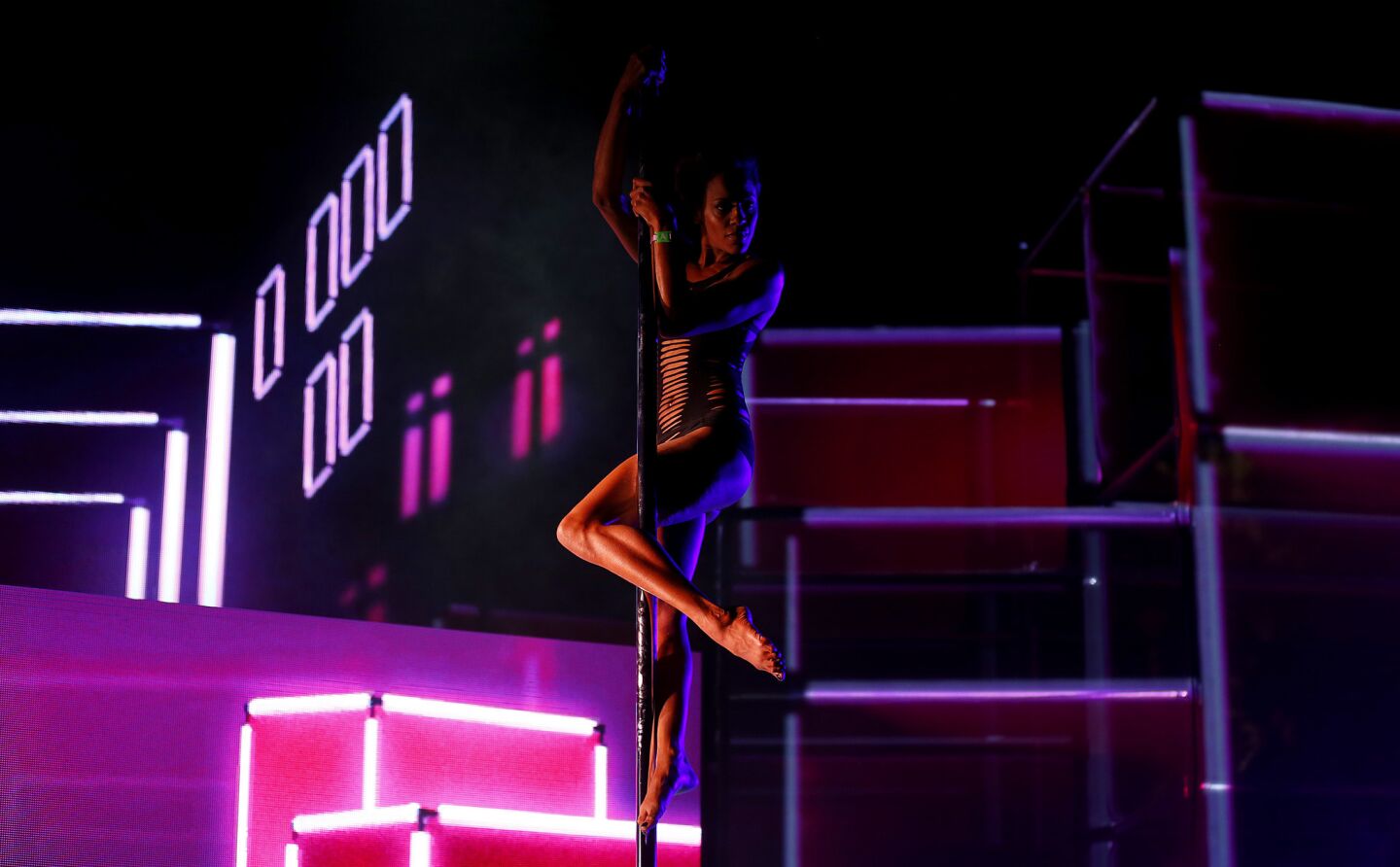 A dancer performs with electropop singer Halsey.