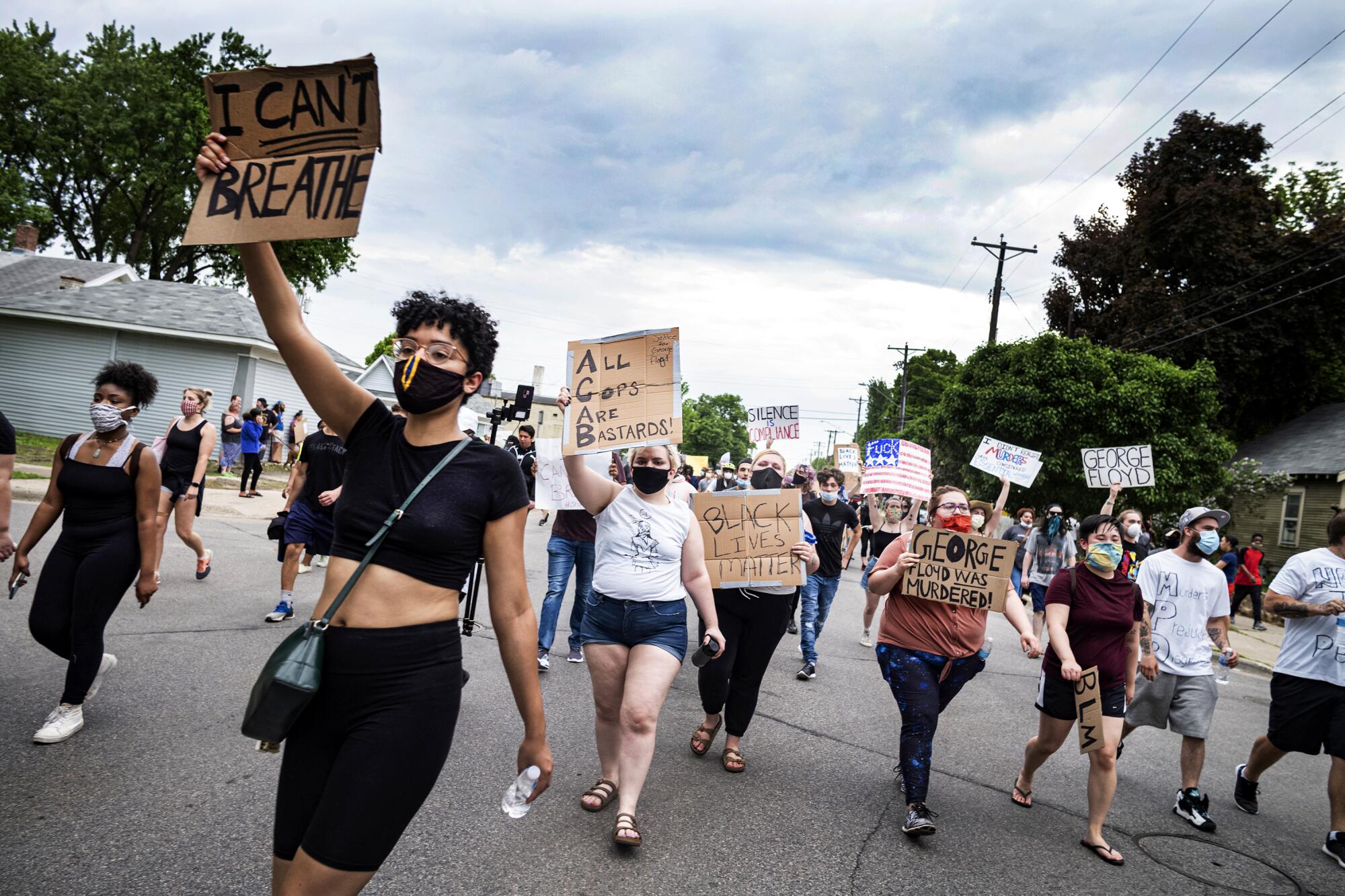 Protesters march after a rally to call for justice for George Floyd in Minneapolis.