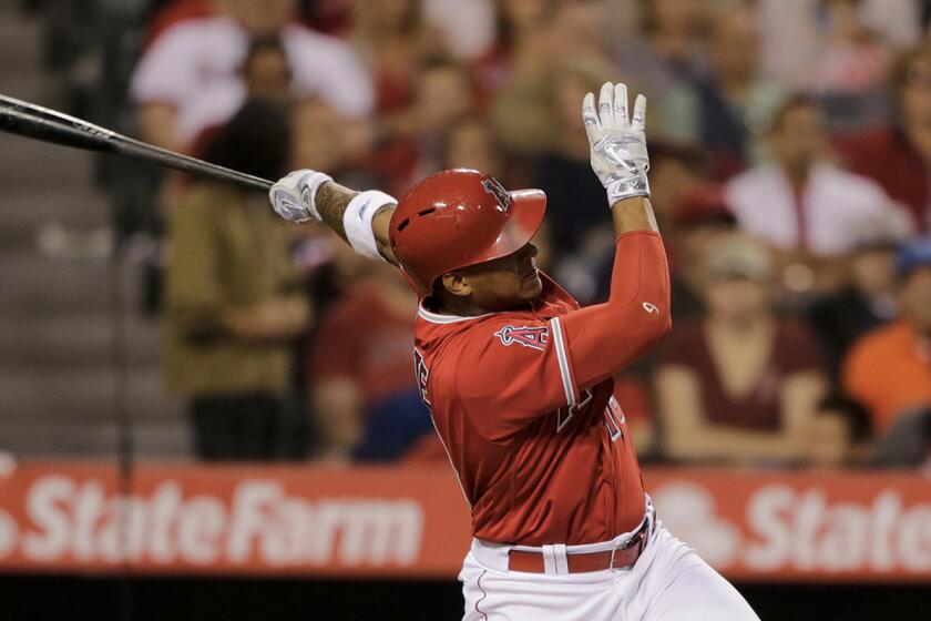 Angels third baseman Jefry Marte singles to score Mike Trout giving the Angels a 1-0 lead against the Minnesota Twins in the fourth inning on June 15.