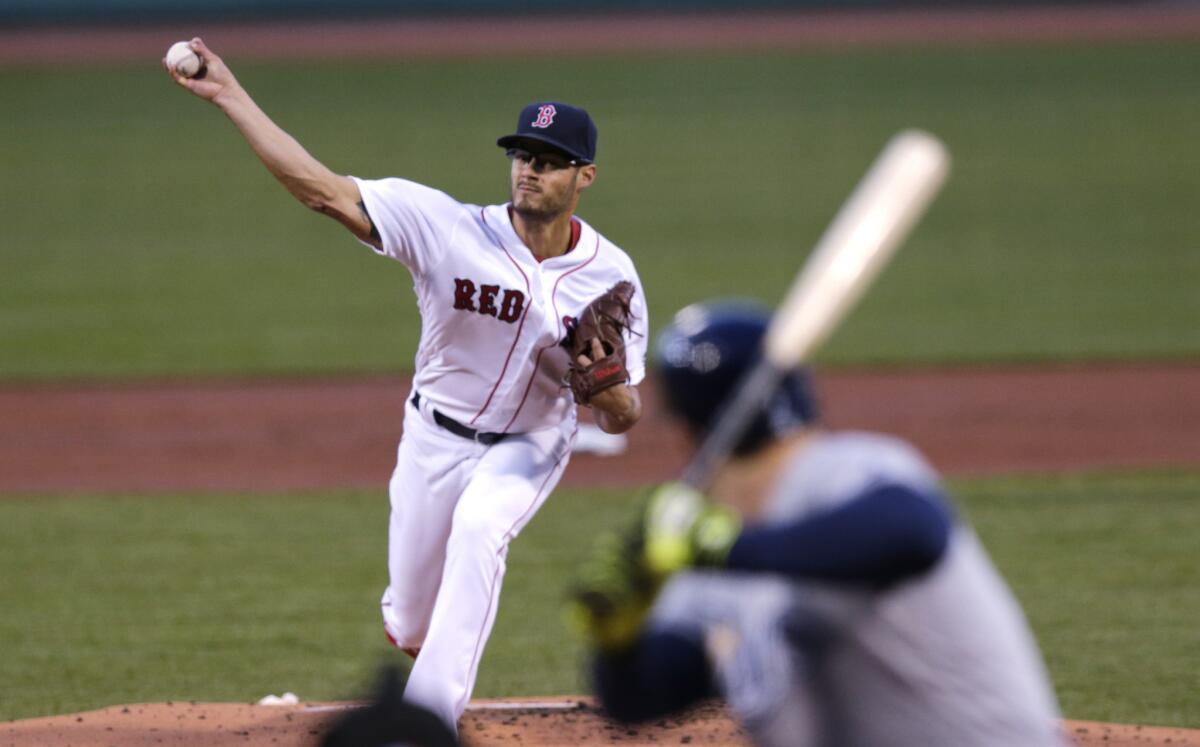 Red Sox starting pitcher Joe Kelly (56) delivers during the first inning of a game against the Rays on Apr. 19.