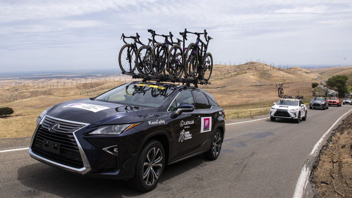 The Education First team car follows the peloton up Patterson Pass in Livermore.