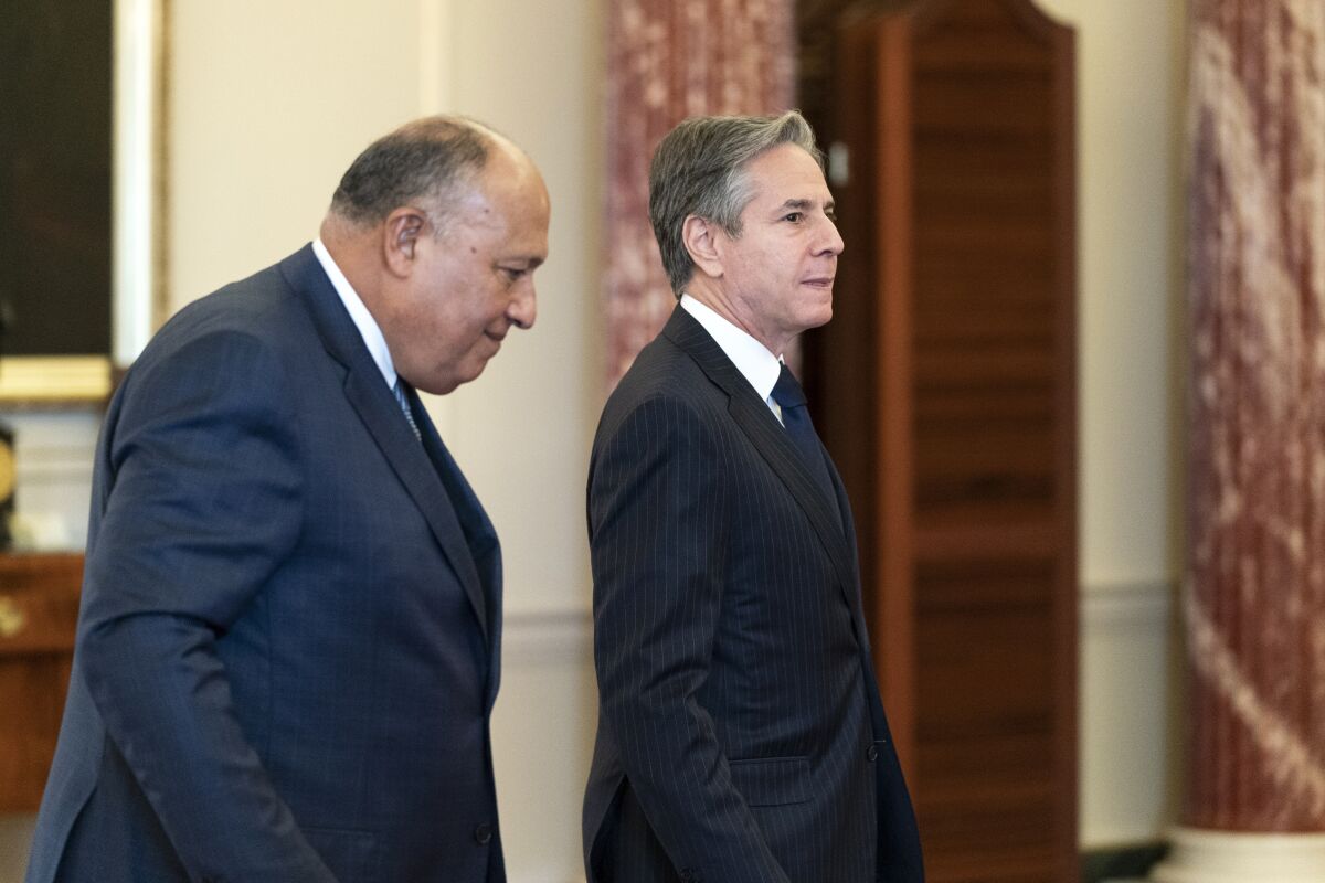 Egyptian Foreign Minister Sameh Shoukry, left, and Secretary of State Antony Blinken depart after a U.S.-Egypt strategic dialogue, at the State Department, Monday, Nov. 8, 2021, in Washington. (AP Photo/Alex Brandon, Pool).
