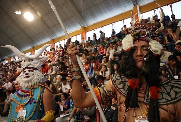 Indigenous people from Ecuador attend a session of the World People's Conference on Climate Change and the Rights of Mother Earth.
