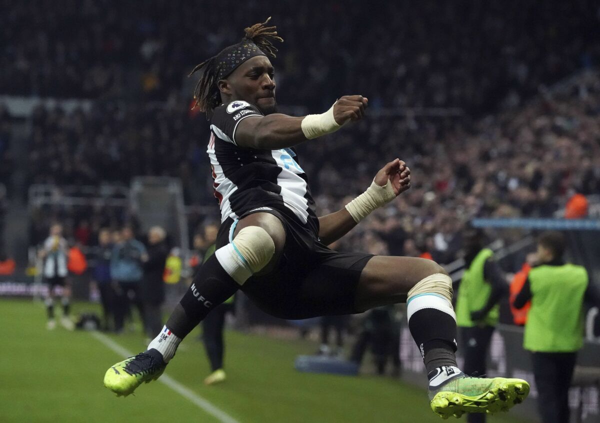 Newcastle United's Allan Saint-Maximin celebrates scoring his side's first goal of the game, during the English Premier League soccer match between Newcastle United and Watford at St James' Park, Newcastle, England, Saturday Jan. 15, 2022. (Owen Humphreys/PA via AP)