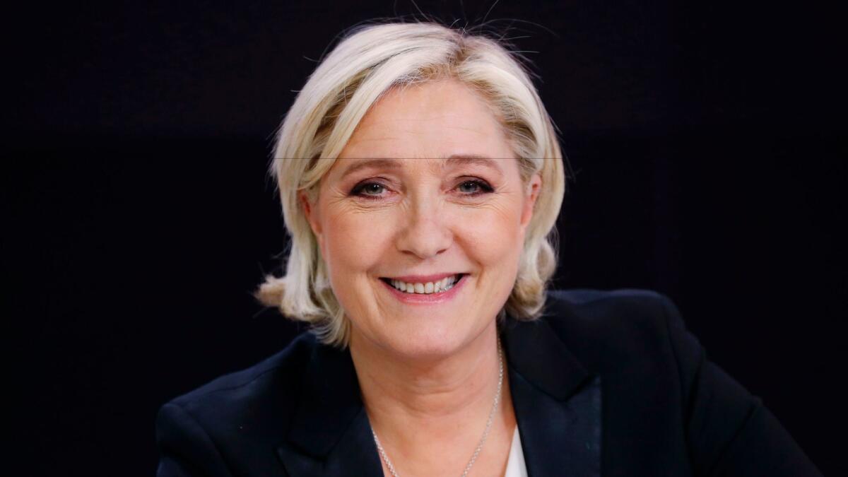Marine Le Pen's move on Monday appears to be a way for her to embrace a wide range of potential voters ahead of France's presidential runoff. She is running against centrist Emmanuel Macron, who received the most votes in Sunday's first round.